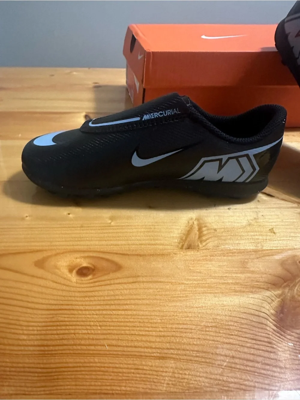 Nike Kids Black Sneakers with White Swoosh